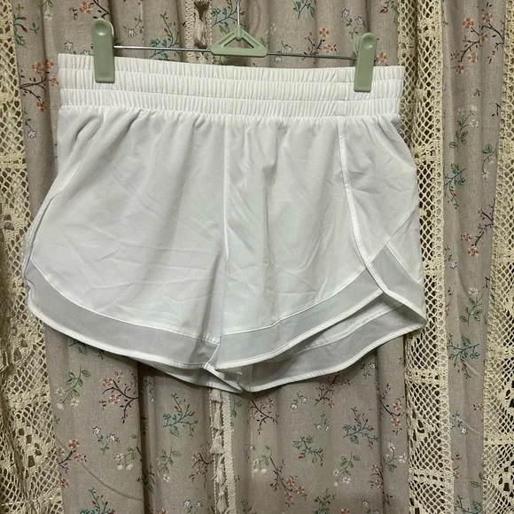 Athleta Mesh Racer Run Mid Rise 4 Short Hidden Pocket Size XS - Picture 2 of 6